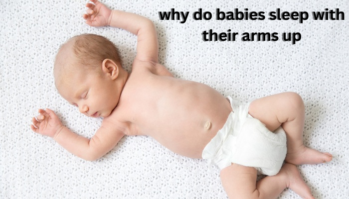 Why do babies sleep with their arms up